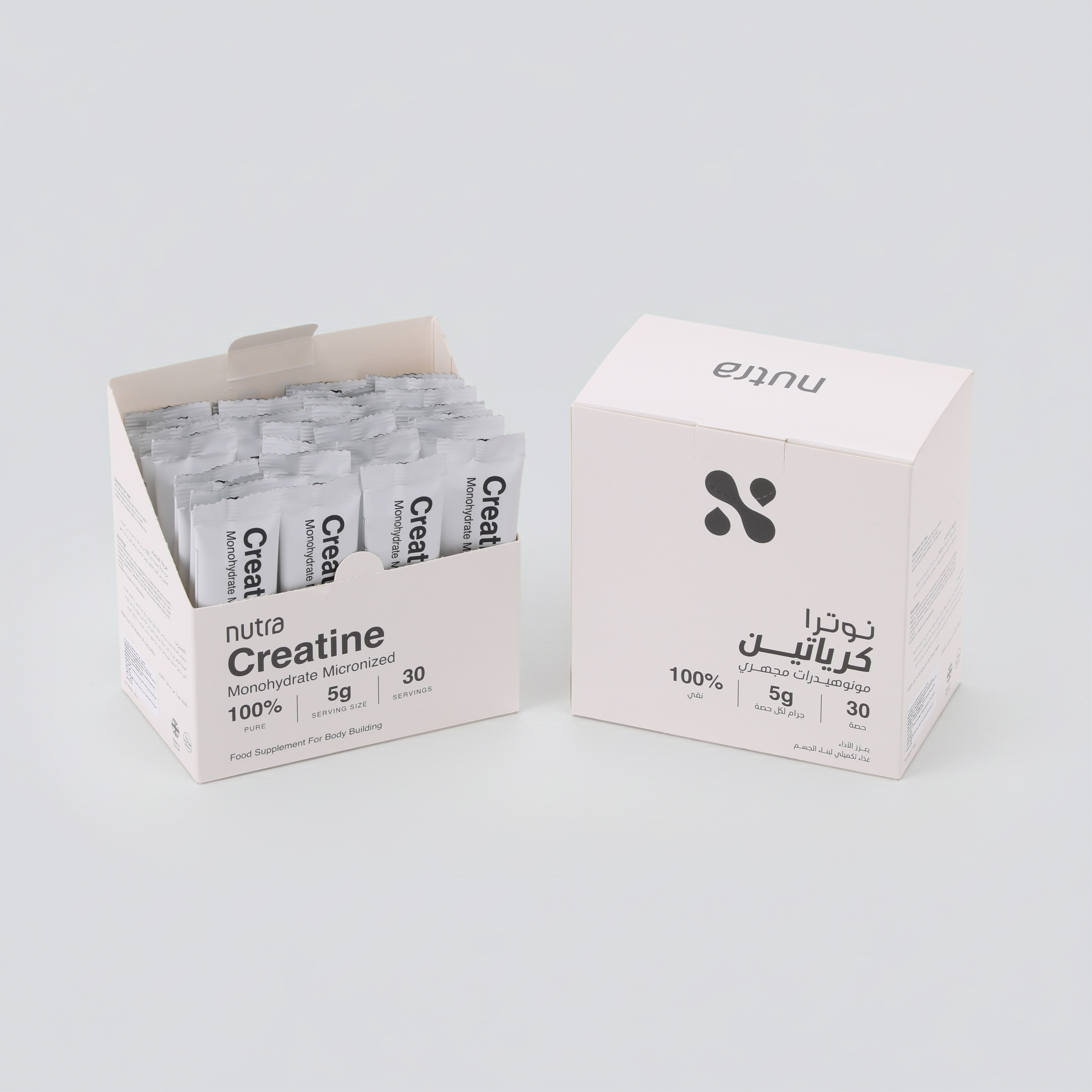 Boxes of nutra Creatine on a light gray background